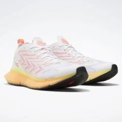 Reebok Sport Zig Kinetica 21 Γυναικεία Παπούτσια FTWWHT/ENEGLW/ORNFLR 12 Reebok Sport Zig Kinetica 21 Γυναικεία Παπούτσια FTWWHT/ENEGLW/ORNFLR -Γυναικεία Παπούτσια Κατάστημα reebok sport zi g kinetica 21 2